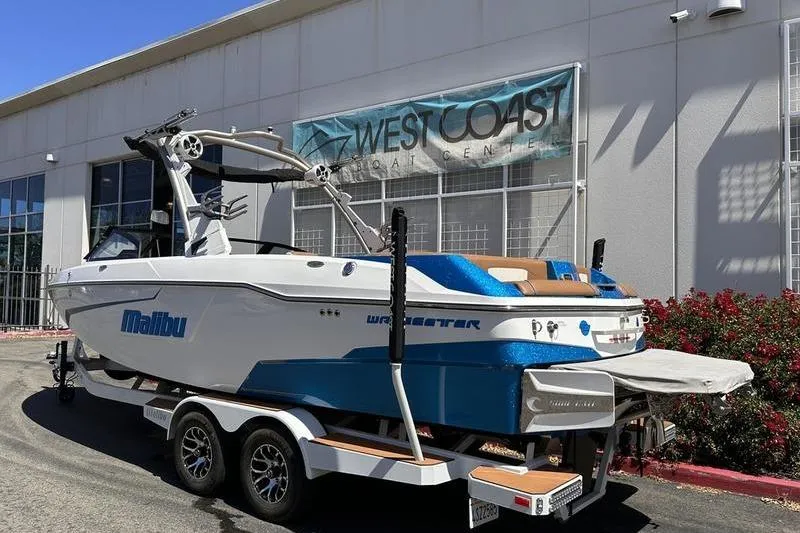 Slide: The Image of 2019 Malibu Wakesetter 25 LSV boat on trailer at West Coast Boat Center. - 1