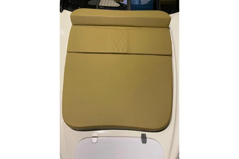 Slide: The Image of Tan cushioned seat on 2024 Hanover HANOVER 305 boat, featuring quilted design. - 26