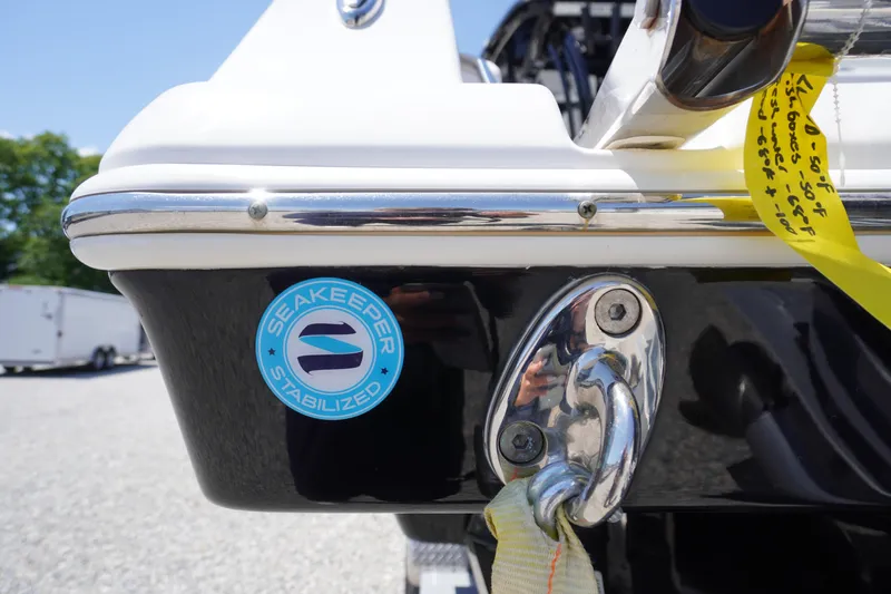 Slide: The Image of 2024 Tidewater 320 CC Adventure boat with Seakeeper stabilization badge. - 12