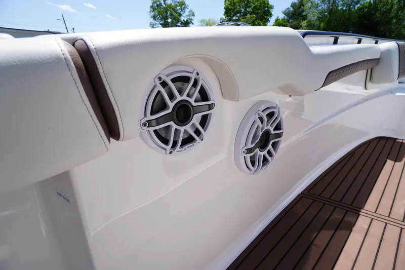Slide: The Image of 2024 Tidewater 320 CC Adventure boat speakers and seating detail. - 39
