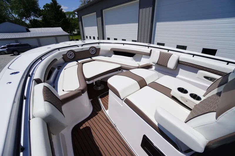 Slide: The Image of 2024 Tidewater 320 CC Adventure boat interior with luxurious seating and modern design. - 51