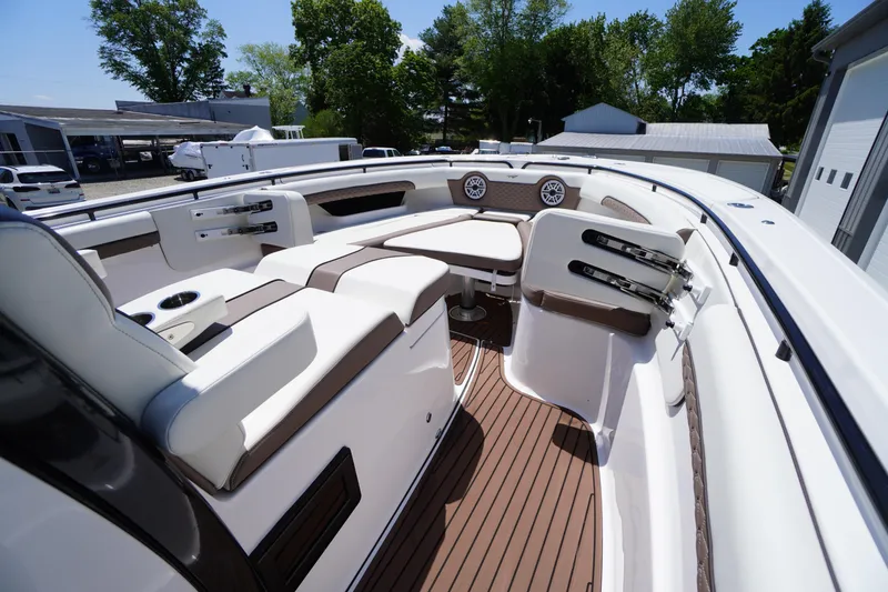 Slide: The Image of 2024 Tidewater 320 CC Adventure boat interior with luxurious seating and modern design. - 52
