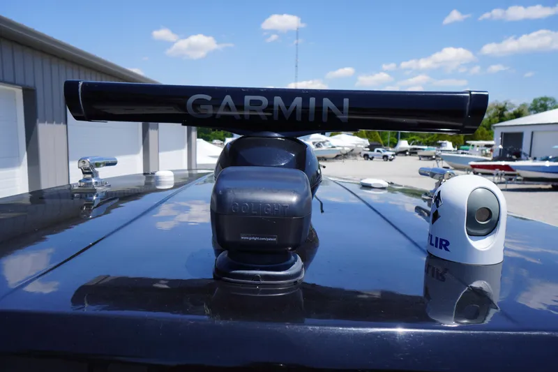 Slide: The Image of 2024 Tidewater 320 CC Adventure boat with Garmin and FLIR equipment on deck. - 59