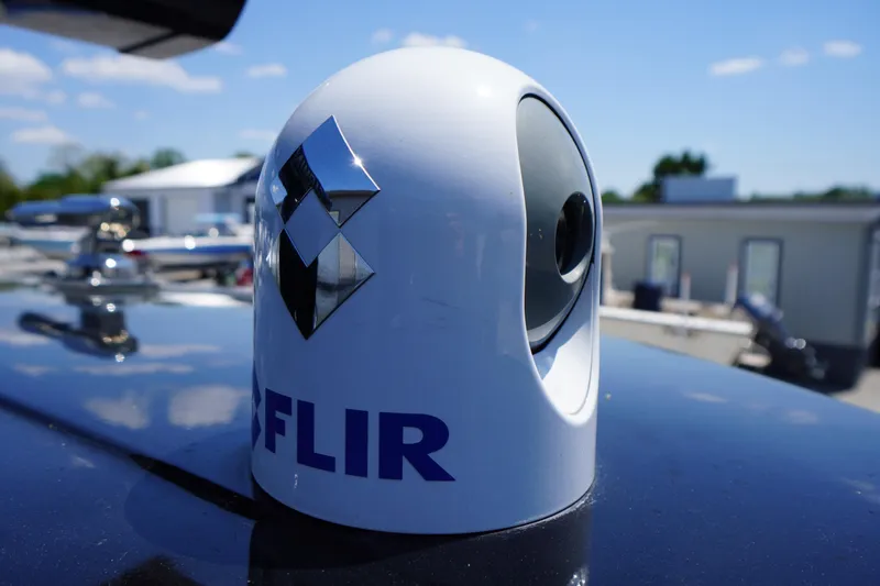 Slide: The Image of FLIR camera on 2024 Tidewater 320 CC Adventure boat, sunny day background. - 61