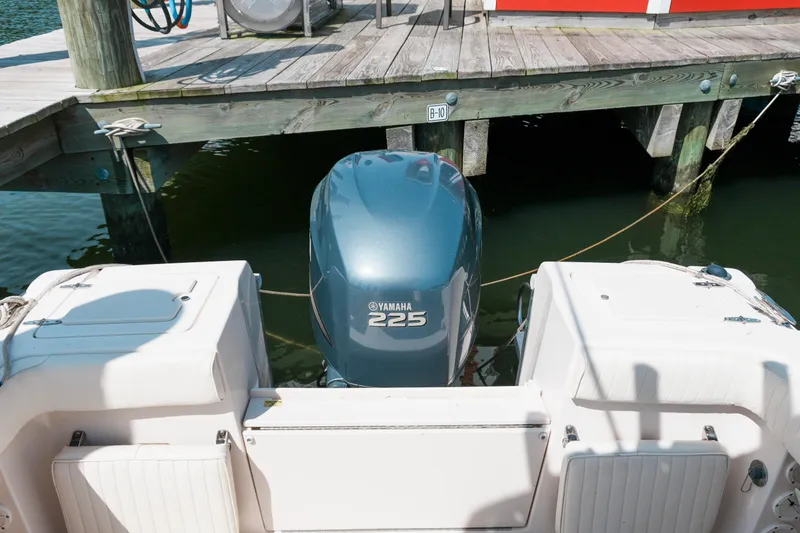 Slide: The Image of 2003 Grady-White Fisherman 222 with Yamaha 225 engine docked at marina. - 7