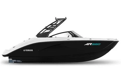 The Image of 2025 Yamaha AR220 boat, sleek black and white design, side view. - 1