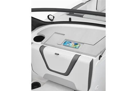 Slide: The Image of 2025 Yamaha AR220 boat dashboard with smartphone holder and storage compartment. - 4