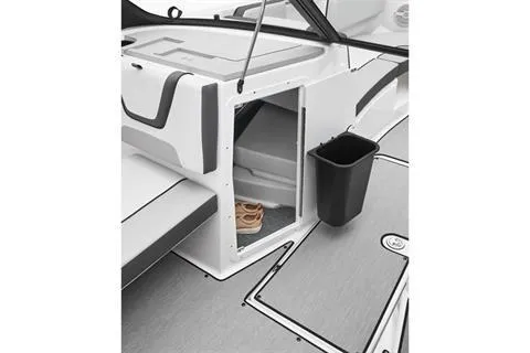 Slide: The Image of 2025 Yamaha AR220 boat interior with storage compartment and sleek design. - 5
