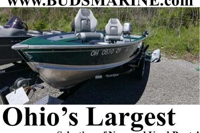 The Image of 2002 Lund 1440-V Rebel Tiller boat on display at Bud's Marine in Ohio. - 0