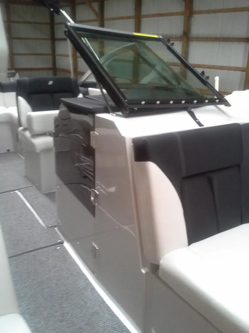 Slide: The Image of Interior view of a 2013 Four Winns SL242 boat. - 10