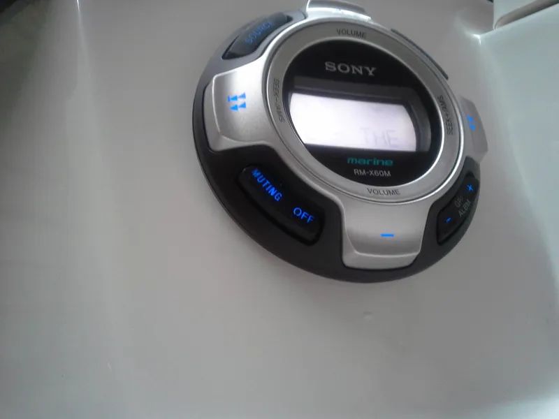 Slide: The Image of Sony marine radio on Four Winns SL242 boat, 2013 model. - 12