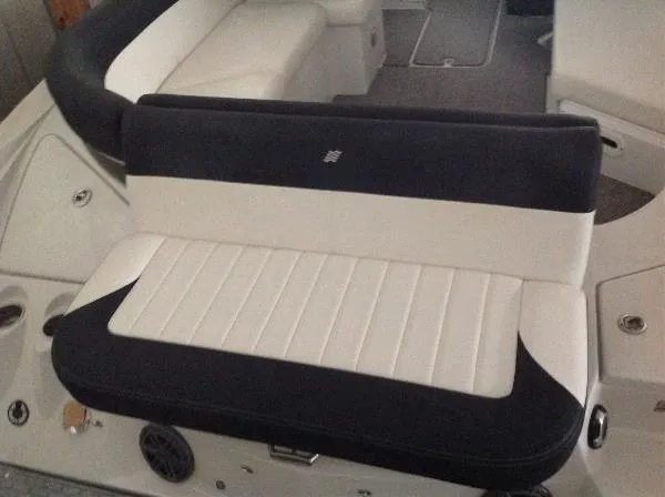 Slide: The Image of Seating on a 2013 Four Winns SL242 boat. - 19