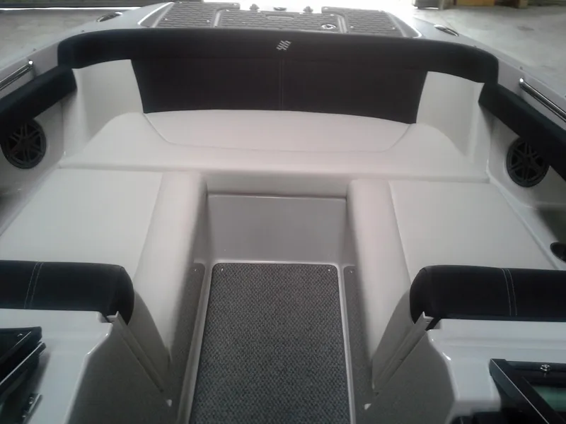 Slide: The Image of Interior of a 2013 Four Winns SL242 boat, gray and black upholstery. - 4