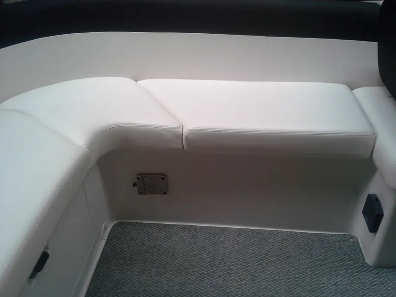 Slide: The Image of Interior of a 2013 Four Winns SL242 with white upholstery. - 6