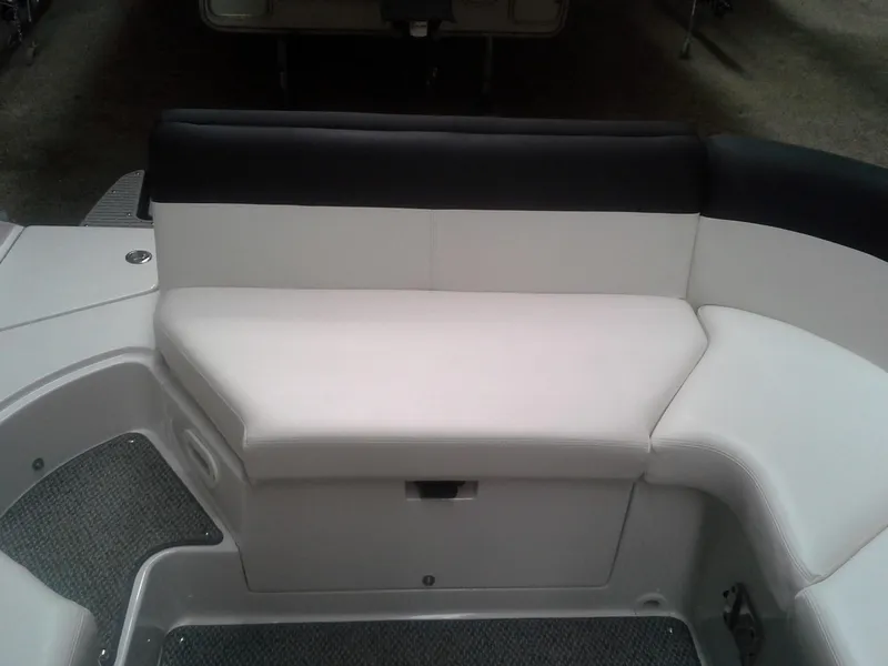 Slide: The Image of 2013 Four Winns SL242 boat seat with black and white upholstery. - 9