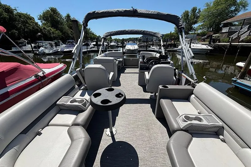 Slide: The Image of 2022 Godfrey Sweetwater 2286 SBX pontoon boat with spacious seating and cup holders. - 4