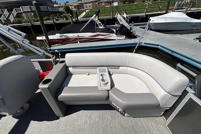 Slide: The Image of Luxurious seating on 2022 Godfrey Sweetwater 2286 SBX pontoon boat at dock. - 6