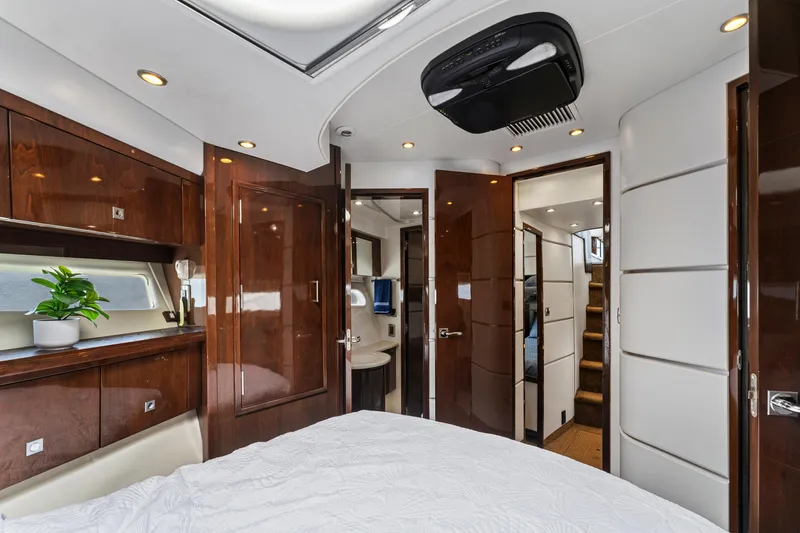 Slide: The Image of Luxurious interior of 2007 Marquis 55 LS yacht with elegant wood finishes and modern design. - 17
