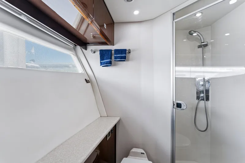 Slide: The Image of Luxurious bathroom in 2007 Marquis 55 LS yacht with modern shower and elegant design. - 25