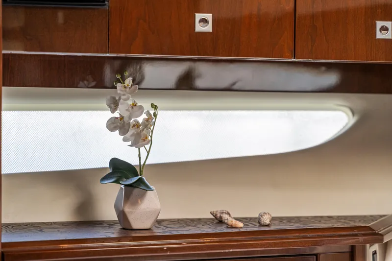 Slide: The Image of Elegant interior of 2007 Marquis 55 LS yacht with orchid and seashell decor. - 27