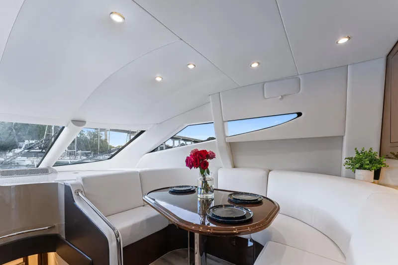 Slide: The Image of Luxurious interior of 2007 Marquis 55 LS yacht with elegant dining area and modern decor. - 37