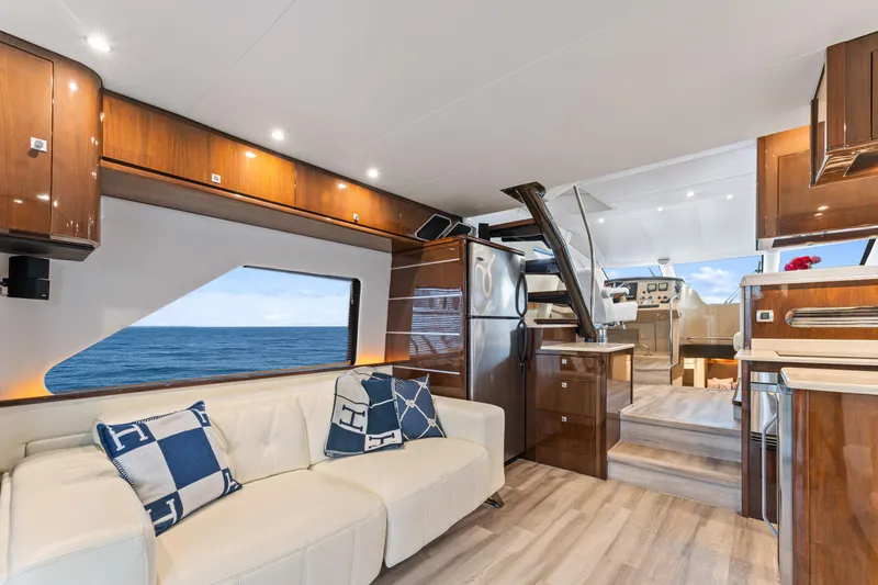 Slide: The Image of Luxurious interior of a 2007 Marquis 55 LS yacht with ocean view. - 44