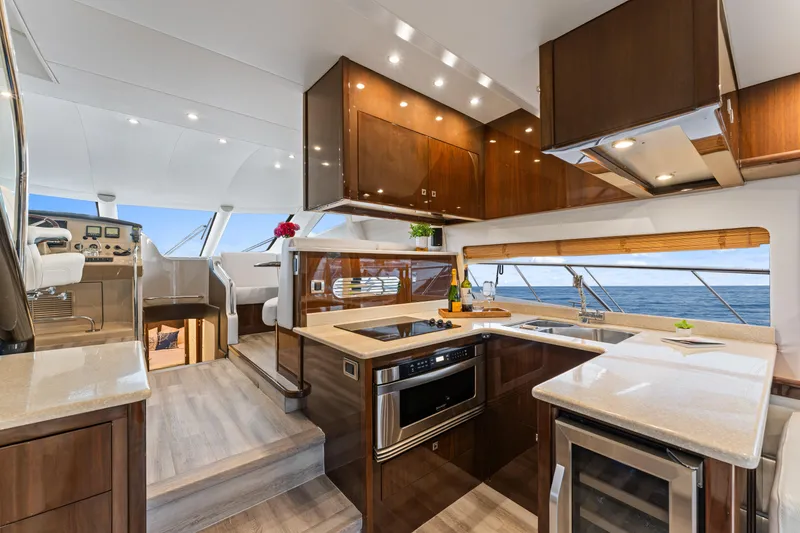 Slide: The Image of Luxurious 2007 Marquis 55 LS yacht interior with modern kitchen and ocean view. - 47