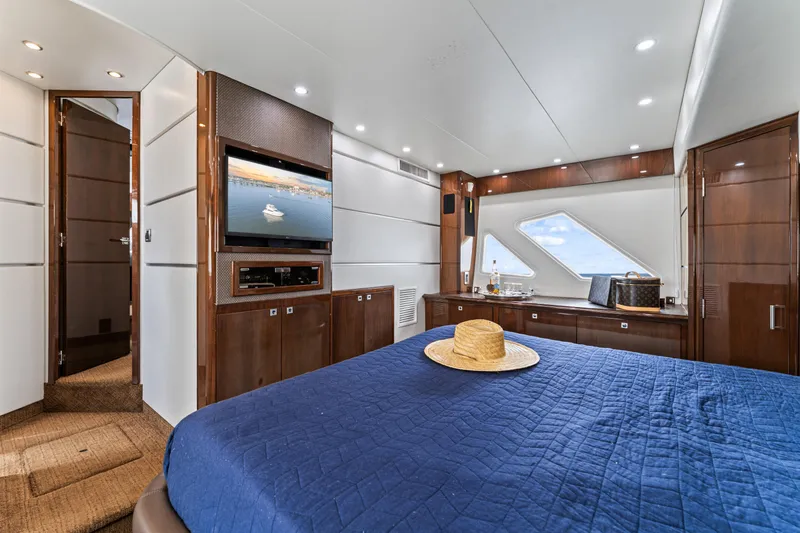 Slide: The Image of Luxurious interior of 2007 Marquis 55 LS yacht with elegant wood finishes and modern amenities. - 59