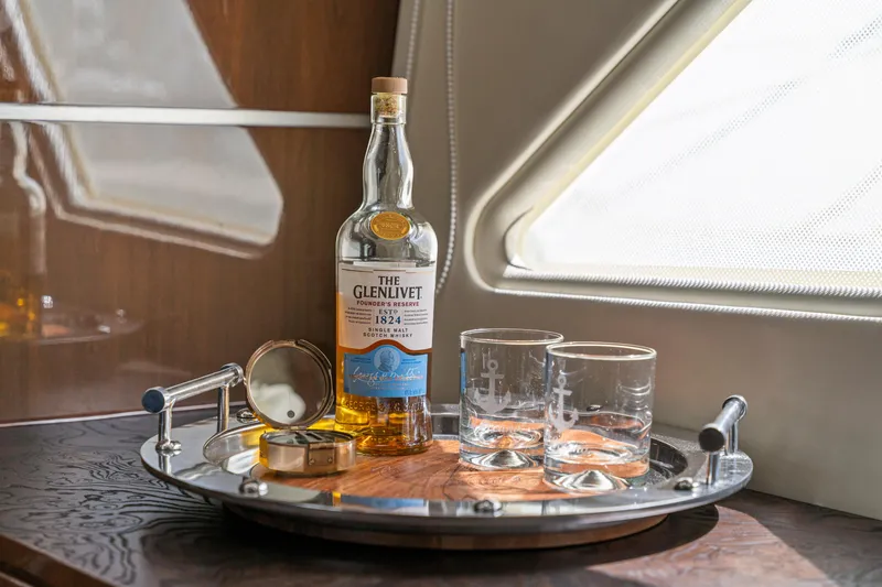 Slide: The Image of Bottle of Glenlivet whisky and glasses on a Marquis 55 LS yacht, 2007 model. - 64