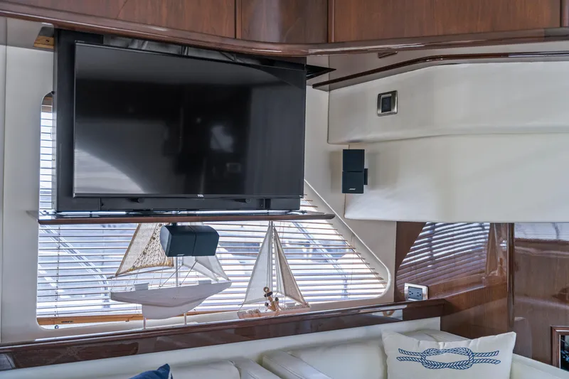 Slide: The Image of Luxurious interior of 2007 Marquis 55 LS yacht with TV and nautical decor. - 67