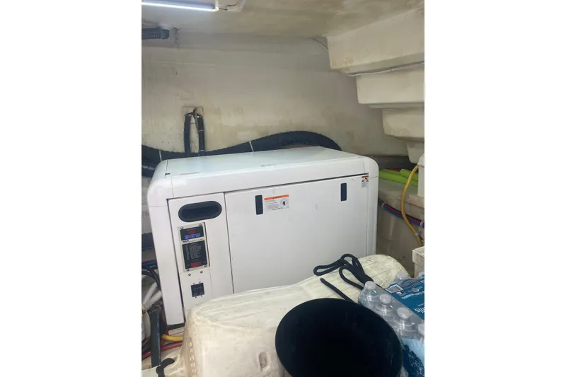 Slide: The Image of Generator in the engine room of a 2007 Marquis 55 LS yacht. - 76