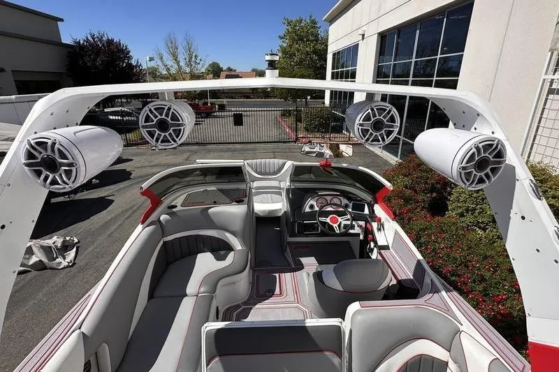 Slide: The Image of 2023 MB SPORTS F22 Tomcat Alpha boat interior with speakers and seating. - 8