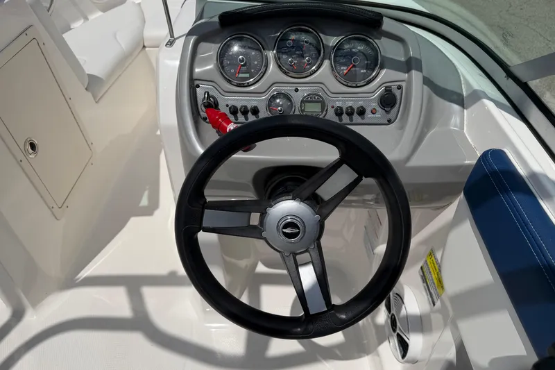 Slide: The Image of Steering wheel and dashboard of 2017 Chaparral 19 H2O Sport boat. - 14