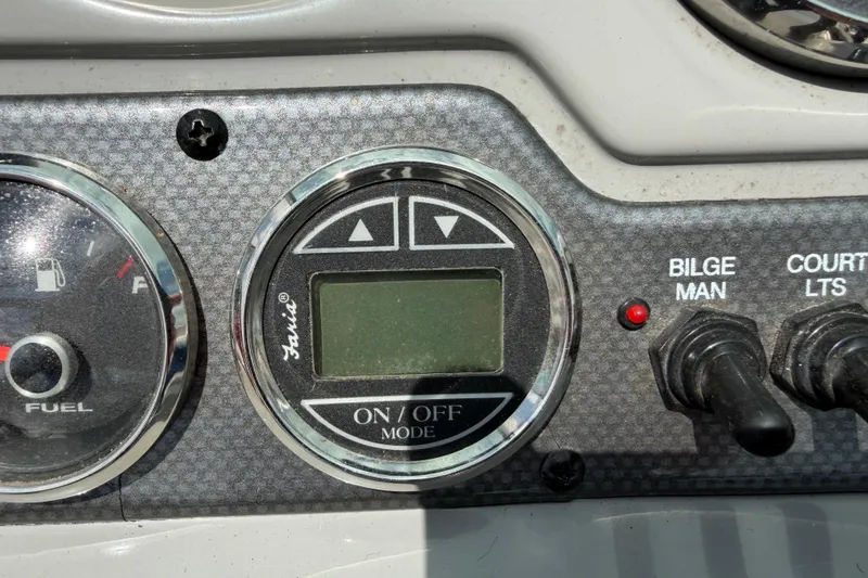 Slide: The Image of Dashboard controls of a 2017 Chaparral 19 H2O Sport boat. - 15