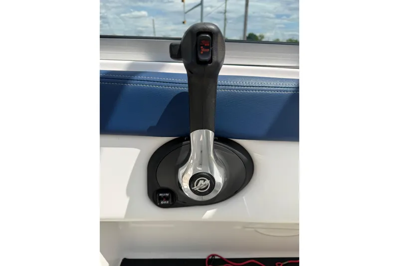 Slide: The Image of Throttle control of a 2017 Chaparral 19 H2O Sport boat, featuring a sleek design. - 19