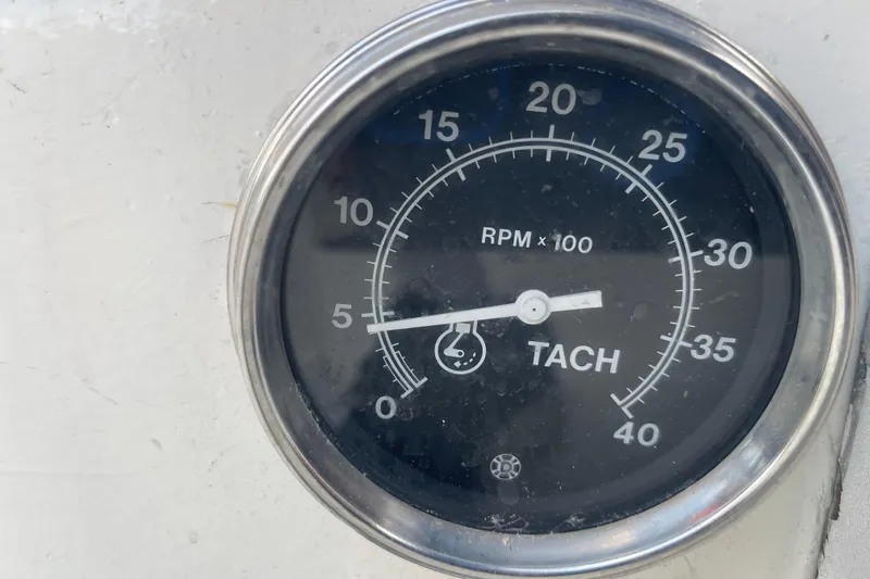Slide: The Image of Tachometer gauge from a 1977 Catalina, displaying RPM x 100 measurements. - 20