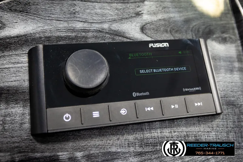 Slide: The Image of 2024 Avalon LSZ CRB Fusion Bluetooth audio control panel on sleek surface. - 32