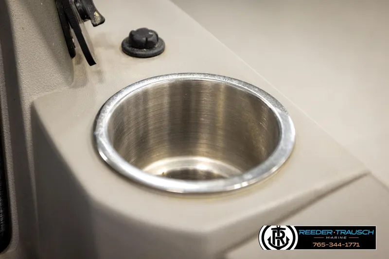 Slide: The Image of 2024 Avalon LSZ CRB boat cup holder detail with Reeder-Trausch Marine logo. - 35