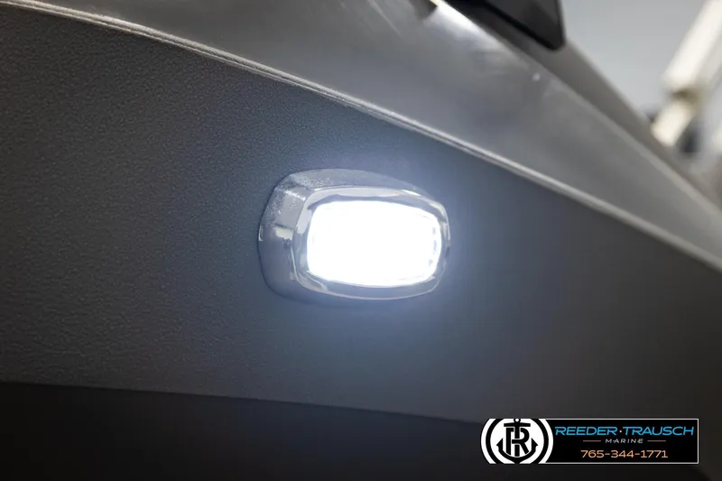 Slide: The Image of 2024 Avalon LSZ CRB boat with illuminated side light, Reeder-Trausch Marine branding. - 42