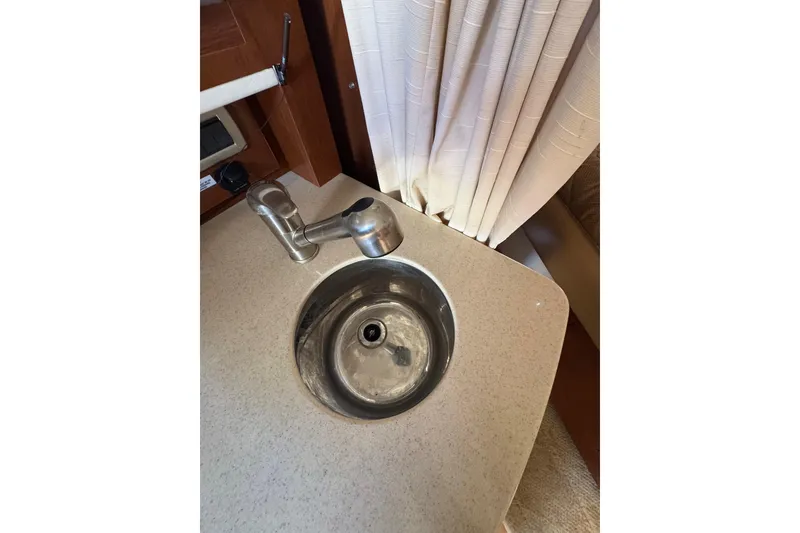 Slide: The Image of Built-in stovetop on 2010 Searay 330 Sundancer yacht kitchen counter. - 32