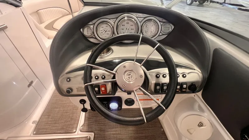 Slide: The Image of Dashboard of a 2013 Cruisers Yachts 258 Sport Series boat. - 18