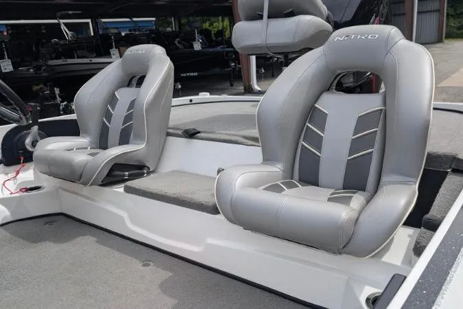 Slide: The Image of 2020 Nitro Z18 boat interior with gray cushioned seats. - 7