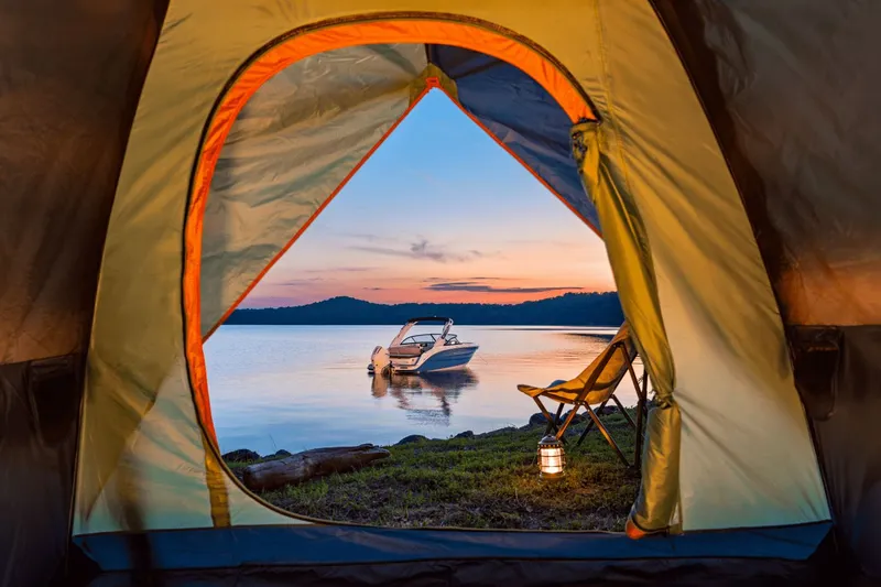 Slide: The Image of View from tent of Sea Ray SDX 230 at sunset. - 9