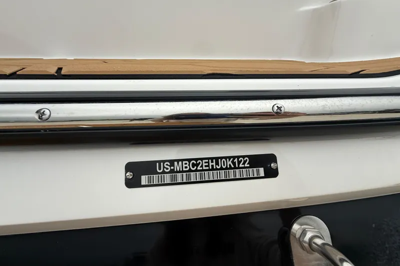 Slide: The Image of 2022 MasterCraft NXT22 boat hull identification number (HIN) plate close-up. - 17