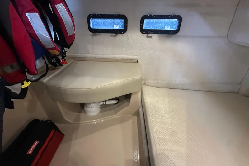 Slide: The Image of Interior cabin of 2018 Ranger Tugs R-31 S with seating and life jackets. - 32