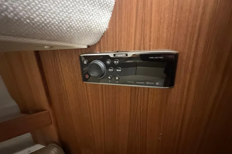 Slide: The Image of Fusion stereo system on 2018 Ranger Tugs R-31 S wooden interior panel. - 47
