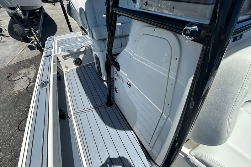 Slide: The Image of 2022 Pathfinder 2600 TRS boat interior with sleek seating and modern design. - 15