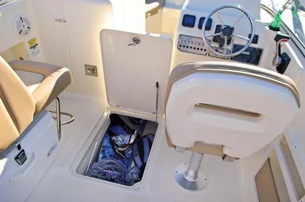 Slide: The Image of Manufacturer Provided Image: 2019 Scout 225 Dorado boat interior with storage compartment open. - 15