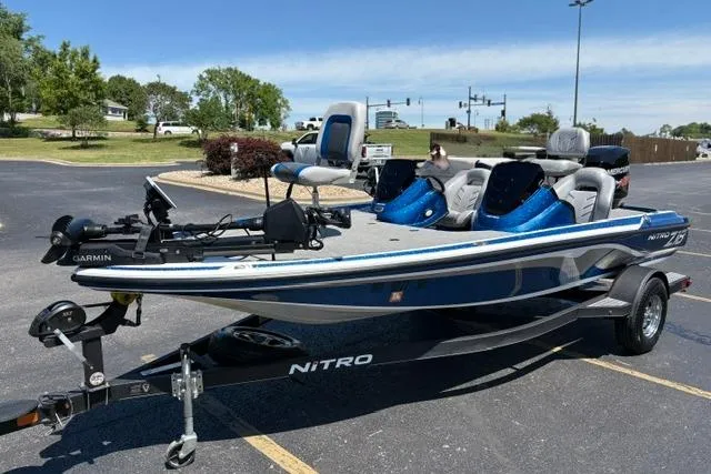 Slide: The Image of 2018 Nitro Z18 fishing boat with trailer in a parking lot. - 15