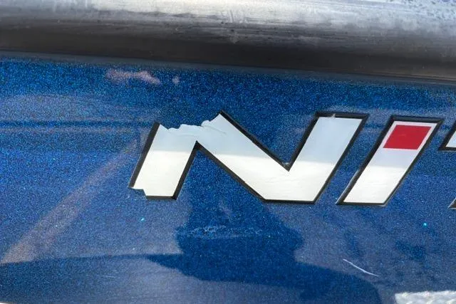 Slide: The Image of Close-up of 2018 Nitro Z18 logo on blue metallic surface. - 19